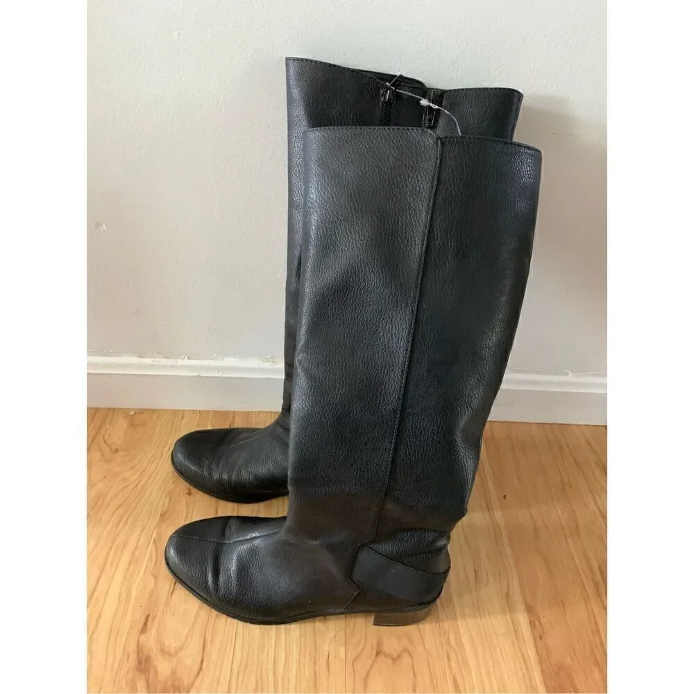 Black riding boots, size 9.5with expendable calf